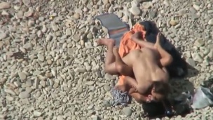 Barefaced girl acquires fucked bad doggy position on a beach