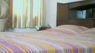Hidden web camera in a hotel room captures BBW Indian aunty tempted for obscene sex