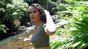 Curly-haired goddess with perfect buttocks gives a ride in the wild