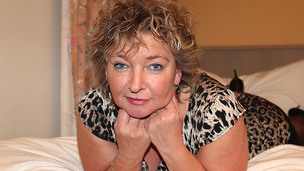 Mature bitch wearing a slutty huge bra looking fierce and wicked