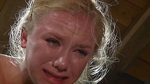 She was a naughty piece of ass and liked taunting men with her sexy body but now Tracy receives what that babe deserves. We've tied her on that wooden frame and spanked her ass so hard that it turned red. Crying won't help this golden-haired cutie and that babe will learn her lesson after some more spanking and rougher humiliation!