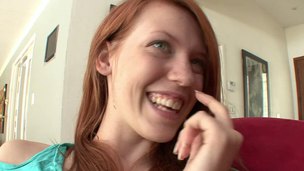 Nice-looking redhead giving a few priceless licks to blonde's shaved cookie