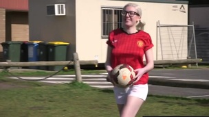 Pigtailed lesbo soccer player receives her curly cunt licked