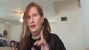 Perverted redhead female-dominant has her lips working their magic on a dick