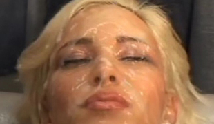 Bukkake. Timid light-haired maturing gets her face wettened in ball butter